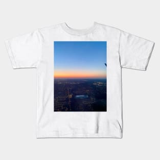 Airplane window sunrise Kids T-Shirt